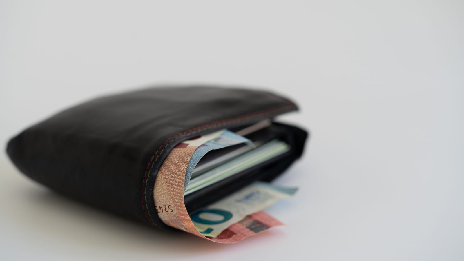 Banknotes in a wallet, the proceeds of a property sale